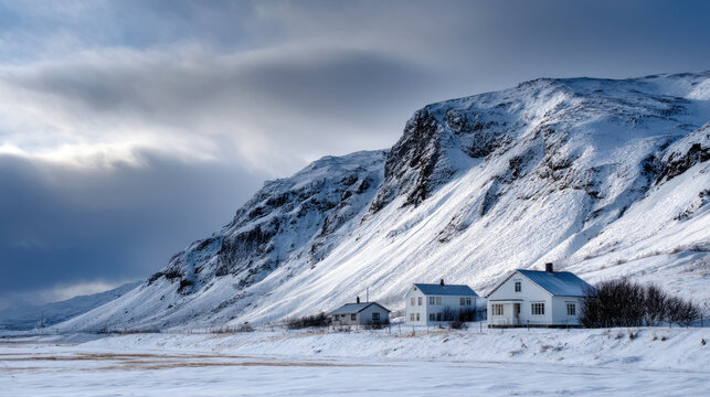 Beautiful view of winter landscape cold frosty day among mountains and warm cozy house in modern style. Rest, vacation, winter holidays away from city bustle. Relaxation and peace, winter background
