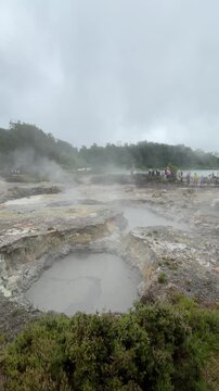 Furnas geothermal activity with steaming caldeiras in azores
