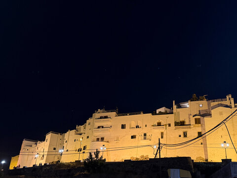Ostuni the White City at night, illuminated skyline in Puglia Italy