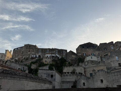Stunning panoramic view of the historic Sassi di Matera, an ancient cave town and UNESCO World Heritage Site in the region of Basilicata, southern Italy. Traditional stone houses
