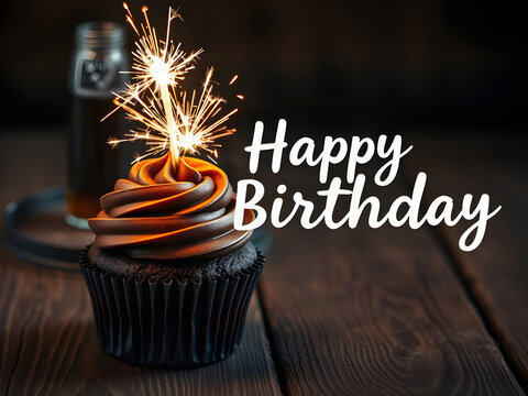 Happy Birthday artisan bakery banner with chocolate cupcake and sparkler on rustic wood