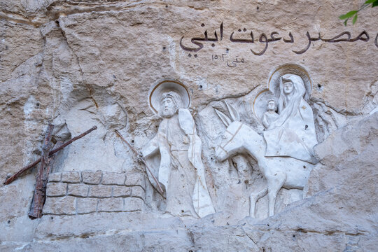 Moqattam neighborhood in Cairo, Egypt. Saint Simon Coptic Monastery. A bas-relief carved into the limestone depicts the Holy Family's Flight into Egypt
