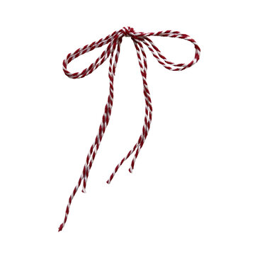 Red and white striped baker's twine bow isolated on white background. Festive twisted cotton string bow for Christmas gift wrapping.