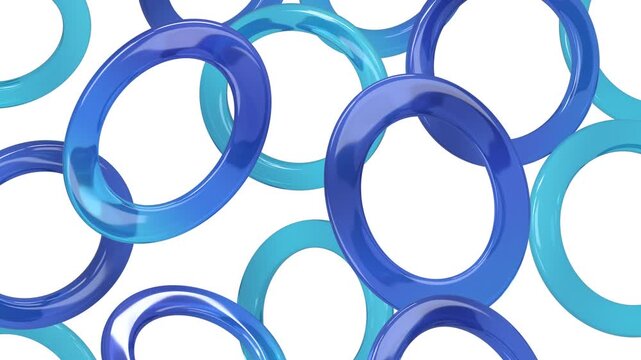 Blue and turquoise plastic ring circles scattered on white background, creating playful abstract pattern with overlapping circular shapes, glossy surfaces, vivid color contrast, and sense of motion