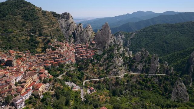 Castelmezzano Dolomiti Lucane drone panning. Most beautiful villages (I Borghi piu belli d'Italia), sharp rocky peaks, winding road to Pietrapertosa, Volo dell Angelo travel 4K video.