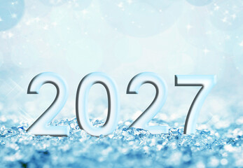 2027, new year card, blue icy snow and bokeh christmas background © Delphotostock