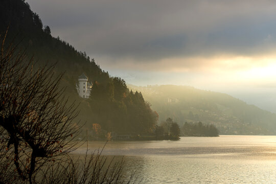 Schloss Heroldeck above Millstatter See in golden mist, Austria