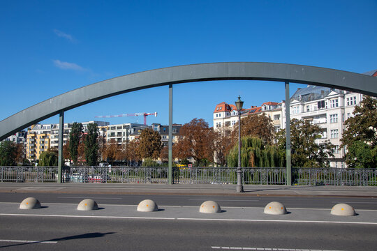 Berlin, Germany; 1st October 2026: Lessingbr&uuml;cke arch bridge spans an urban street in Berlin&rsquo;s Moabit district on a clear day
