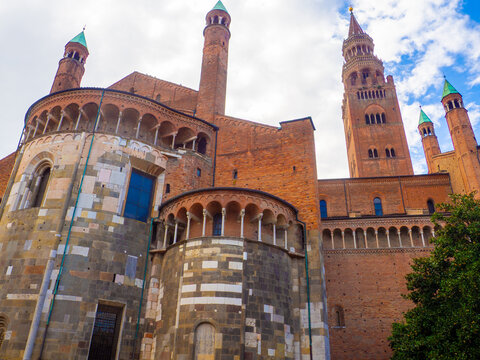 Cremona Cathedral in Italy, showing its brick Romanesque apses with loggias