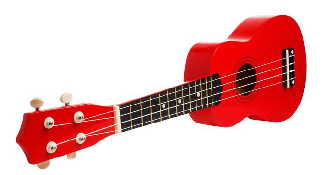 Red soprano ukulele with four strings, side perspective view, isolated on transparent cutout background