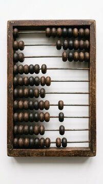Antique wooden abacus with dark beads on white background vintage counting tool educational math tool