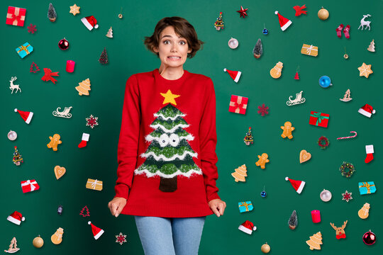 Photo of pretty sweet lady dislike new red print jumper clothes xmas gift present surprise empty space isolated on green color background