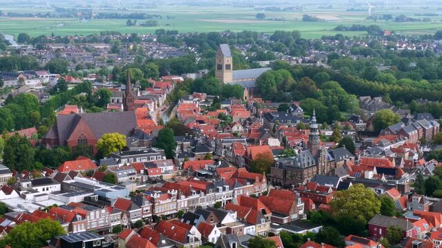 Aerial view of Bolsward with town hall and historic churches in Friesland