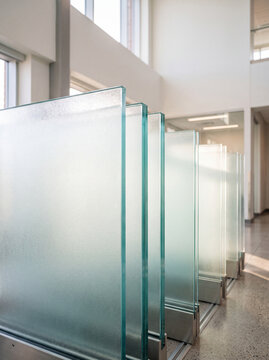 Row Of Frosted Glass Panels In Modern Office Interior