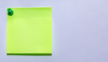 Blank Green Sticky Note Pinned to White Surface Paper Note Background Copy Space © Theja