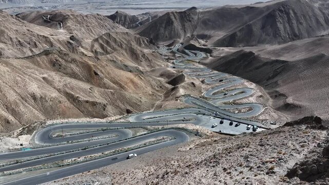 panlong ancient road winding mountain highway in xinjiang desert landscape