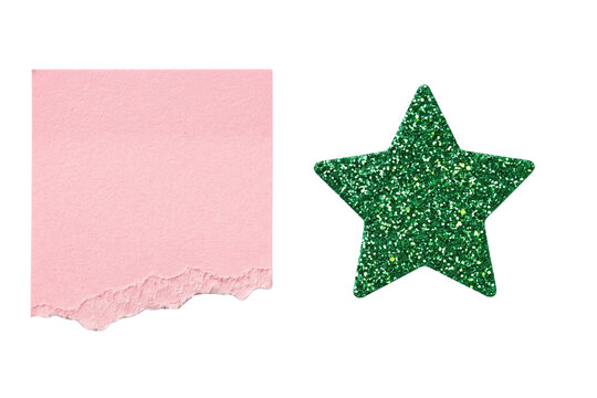 Christmas celebration features glitter star decoration on pink torn paper background for festive holiday design