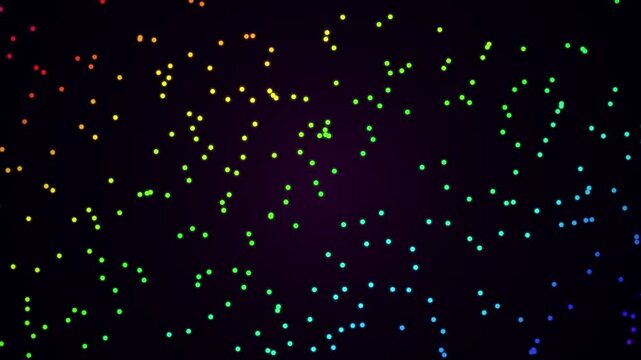 Colorful light particles moving across dark background for digital