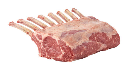 Fresh raw bone-in rib roast with exposed rib bones isolated against a solid black background © Ophelia