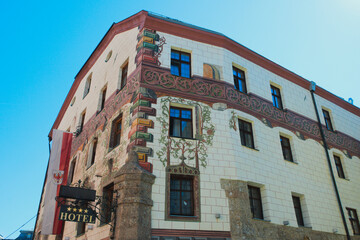 Historic Hotel Goldener Adler facade with traditional paintings in Innsbruck Austria © Gherzak