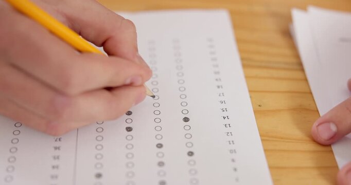 Hands, writing and test in high school with multiple choice, problem solving and quiz for education. Student, person and circle solution in class for final exam, learning and knowledge assessment.