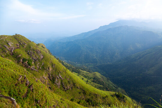 Green mountain ridge and valley under a hazy sky, Uva Province, Ella, Sri Lanka