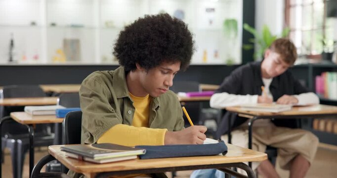 Student, teenager and writing in classroom with test, critical thinking and info recall for answer. Education, boy or assessment at high school for evaluation exam, problem solving or decision making