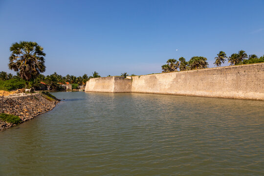 Wall of the old fort built by the Portuguese above a wide moat, Northern Province, Mannar, Sri Lanka