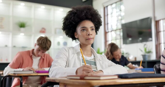 Writing, thinking and girl in classroom for exam answer, learning and remember study notes. University, school and student with assignment, solution and thought for assessment, test and lesson
