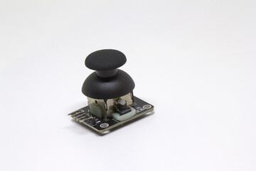 Dual axis analog joystick module for electronics projects isolated on white background © Engin