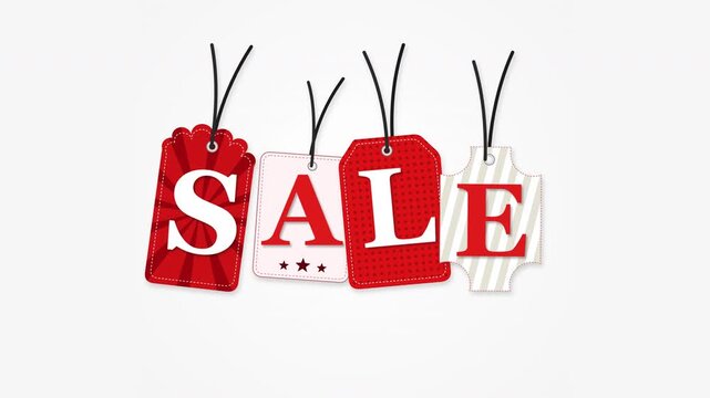 Red and white discount sale tags hanging on strings for retail promotion and marketing campaigns