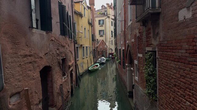 Quiet Venetian Canal View From Historic Bridge