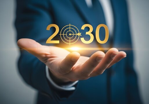 Business person holding glowing year twenty thirty with target icon floating above open palm