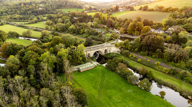 Aerial view of the Dundas Aqueduct over a river in rural English landscape