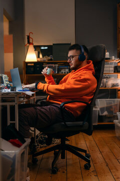 Young Developer Working Late in Home Office