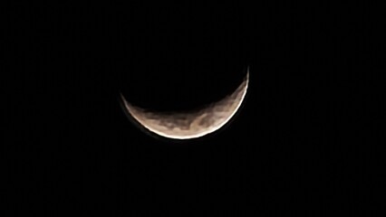 Glowing Crescent Moon in the Dark Night Sky Background © Willy