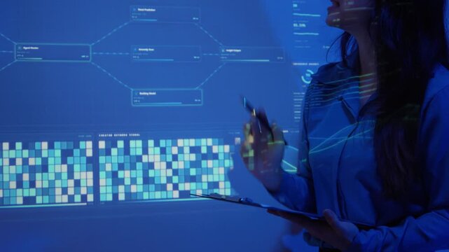 Businesswoman presenting a futuristic data dashboard with interactive charts, graphs and network diagrams