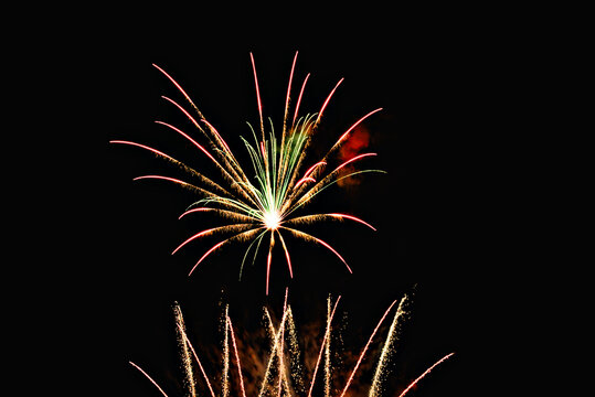 Fireworks lighting up the night sky. Pyrotechnics, abstract	