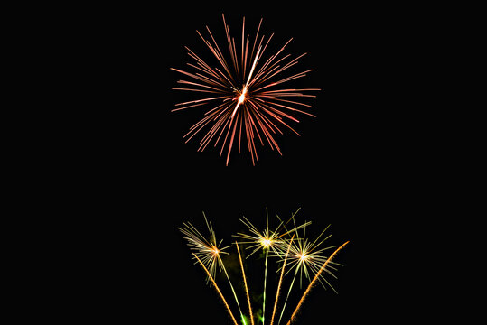 Fireworks lighting up the night sky. Pyrotechnics, abstract	