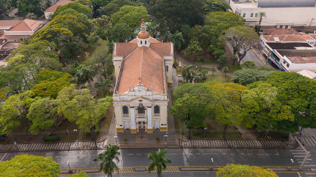Aerial view of the Our Lady of the Sustenance church surrounded by lush green trees and park grounds in Araras, Sao Paulo, Brazil.