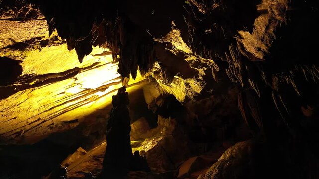 Limestone cave interior with dramatic lighting