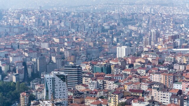 Mass housing in Istanbul, Turkey, endless hazy apartment blocks across the hills of the crowded city