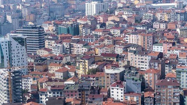 Crowded residential neighborhood in Istanbul, Turkey, closely packed apartment buildings and high rise blocks seen from above, with almost no green areas