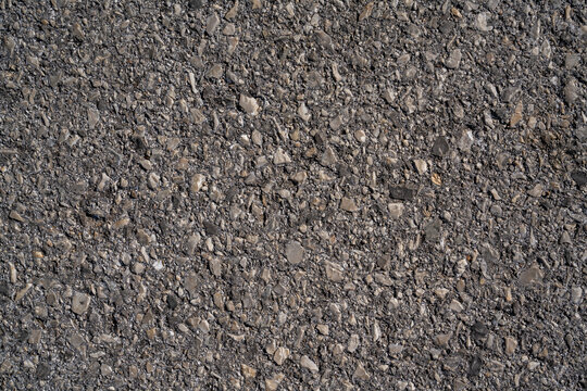 Dark Pebbled Pavement Surface