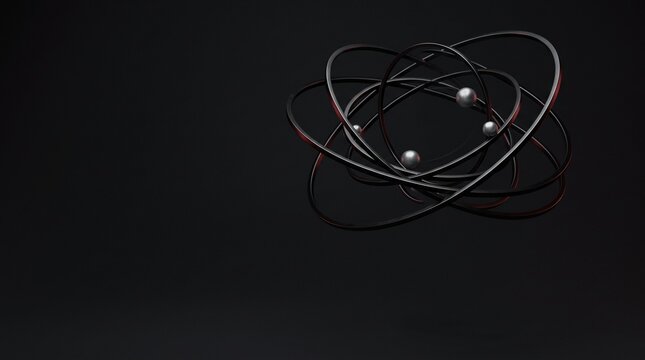 Metallic orbital rings circling small silver spheres in an abstract atom model floating against a dark empty space
