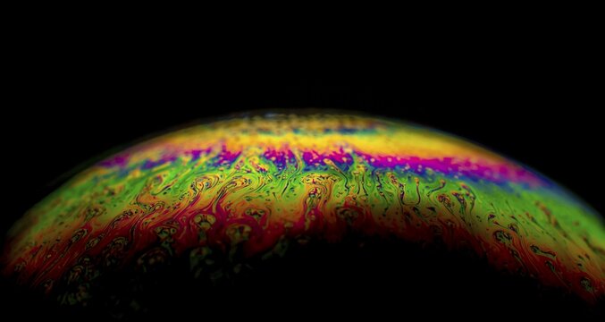 Interference of equal thickness, soap bubble, light reflected in all colours