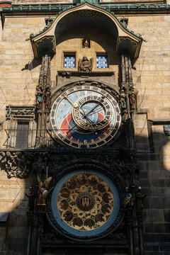 Prague, Czechia - 04 October 2026: View of the Prague Astronomical Clock featuring intricate zodiac dials, ornate statues, and detailed medieval stonework on the Old Town Hall wall.