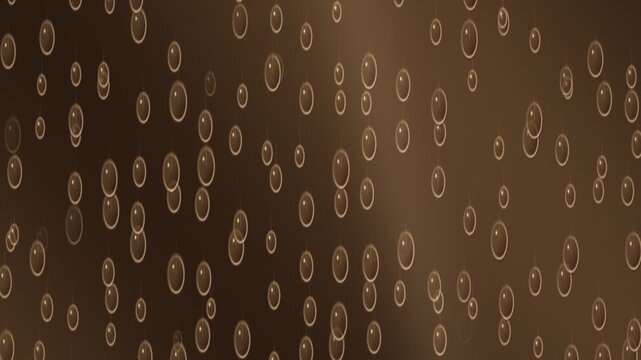 Abstract animation of falling oval shapes in shades of brown and gold, creating a mesmerizing visual effect