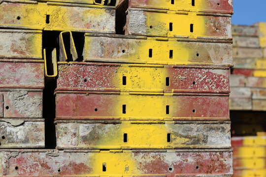 stack of steel-framed concrete formwork panels. shuttering construction background.