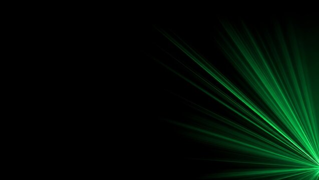 Green light rays burst isolated on black background, abstract luminous flare effect for creative graphic design projects